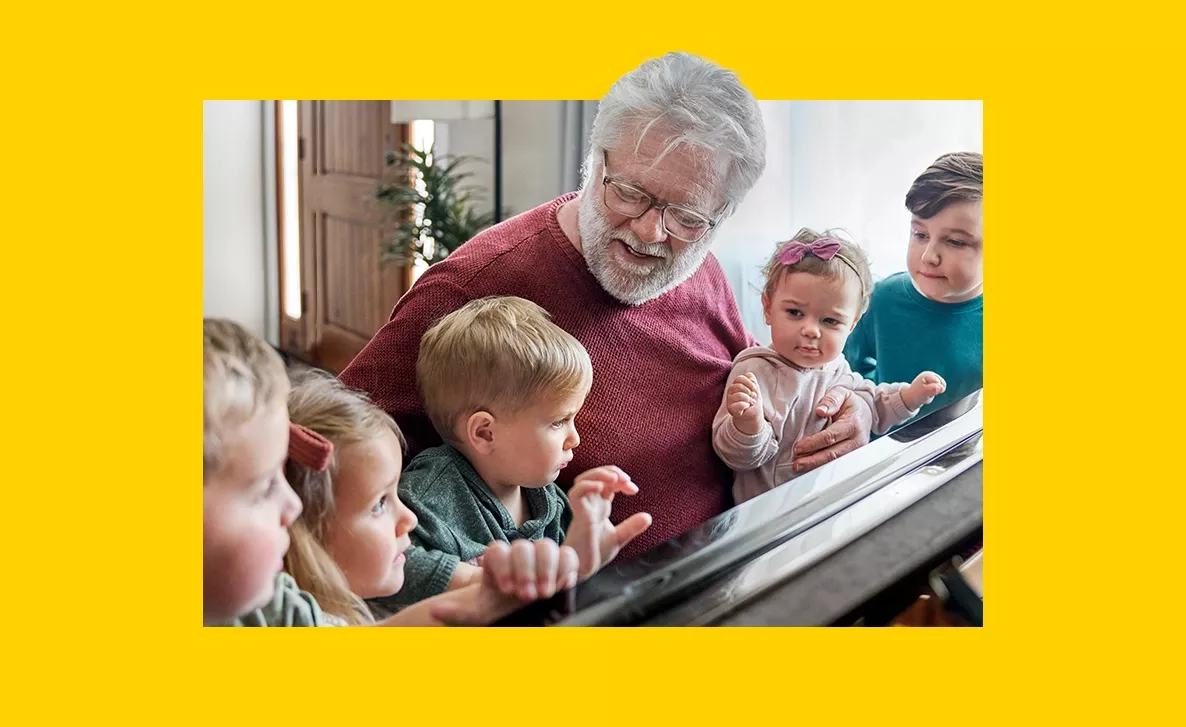  Grandpa with his kids playing piano
